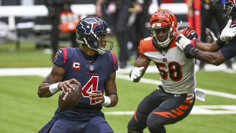 Dec 27, 2020; Houston, Texas, USA; Houston Texans quarterback Deshaun Watson (4) looks for an open receiver against the Cincinnati Bengals during the second quarter at NRG Stadium. Mandatory Credit: Troy Taormina-USA TODAY Sports