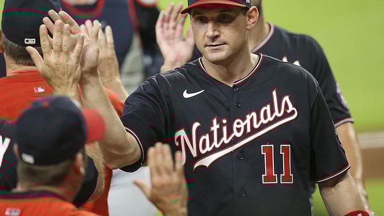 Jun 1, 2021; Atlanta, Georgia, USA; Washington Nationals first baseman Ryan Zimmerman (11) celebrates with teammates after a victory against the Atlanta Braves at Truist Park. Mandatory Credit: Brett Davis-USA TODAY Sports