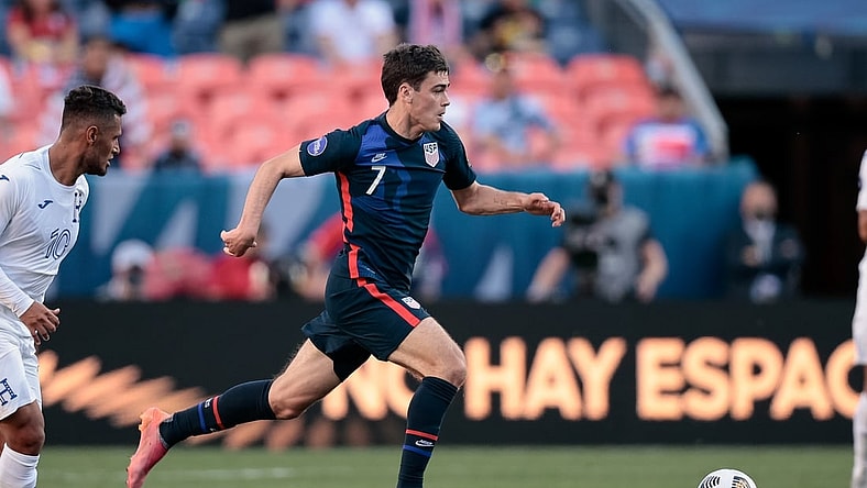 Jun 3, 2021; Denver, Colorado, USA; United States forward Gio Reyna (7) controls the ball in the first half against Honduras during the semifinals of the 2021 CONCACAF Nations League soccer series at Empower Field at Mile High. Mandatory Credit: Isaiah J. Downing-USA TODAY Sports