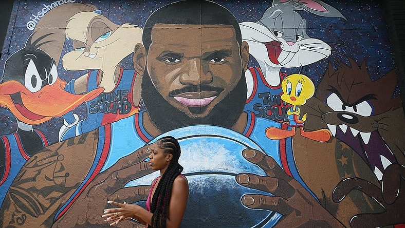 Chardae Slater, 24, a Kent State University art student, talks about painting the LeBron James "Space Jam" mural on West Market  and North Valley Street  on Wednesday July 21, 2021. The painting was Slater's first attempt at a mural.

Mural 1