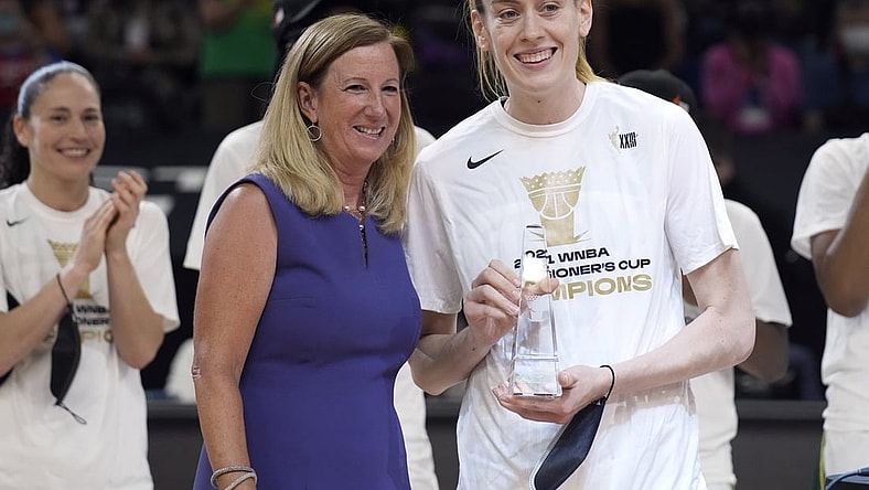 Aug 12, 2021; Phoenix, Arizona, USA; WNBA commissioner Cathy Engelbert and Seattle Storm forward Breanna Stewart (30) pose with the MVP trophy after a victory by Seattle over the Connecticut Sun during the Inaugural WNBA Commissioners Cup Championship Game at Footprint Center. Mandatory Credit: Rick Scuteri-USA TODAY Sports
