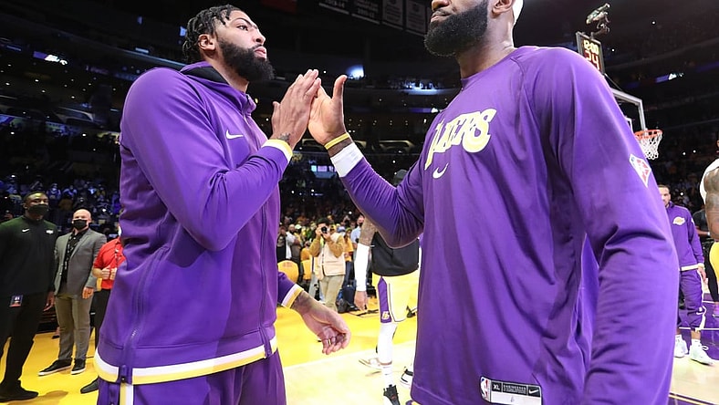 Oct 19, 2021; Los Angeles, California, USA; Los Angeles Lakers forward Anthony Davis (3) and forward LeBron James (6)  hi-five prior to the game against the Golden State Warriors at Staples Center. The Warriors won 121-114. Mandatory Credit: Kiyoshi Mio-USA TODAY Sports
