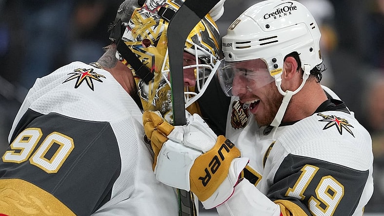 Oct 29, 2021; Las Vegas, Nevada, USA; Vegas Golden Knights right wing Reilly Smith (19) congratulates Vegas Golden Knights goaltender Robin Lehner (90) after the Golden Knights defeated the Anaheim Ducks 5-4 in a shootout at T-Mobile Arena. Mandatory Credit: Stephen R. Sylvanie-USA TODAY Sports