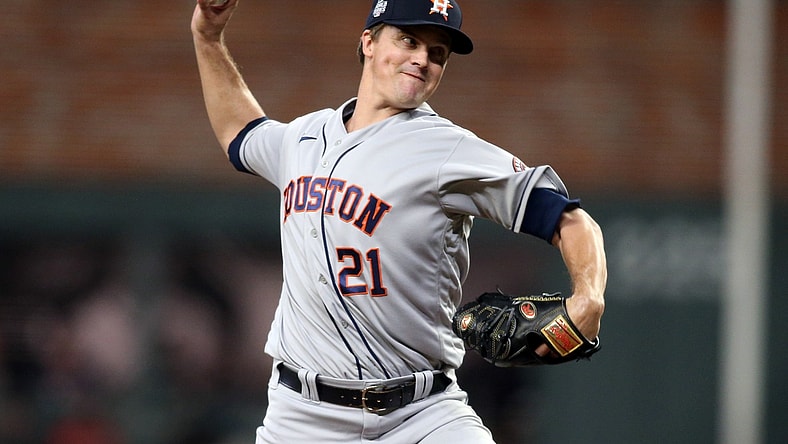 Oct 30, 2021; Atlanta, Georgia, USA; Houston Astros starting pitcher Zack Greinke (21) throws against the Atlanta Braves during the first inning of game four of the 2021 World Series at Truist Park. Mandatory Credit: Brett Davis-USA TODAY Sports