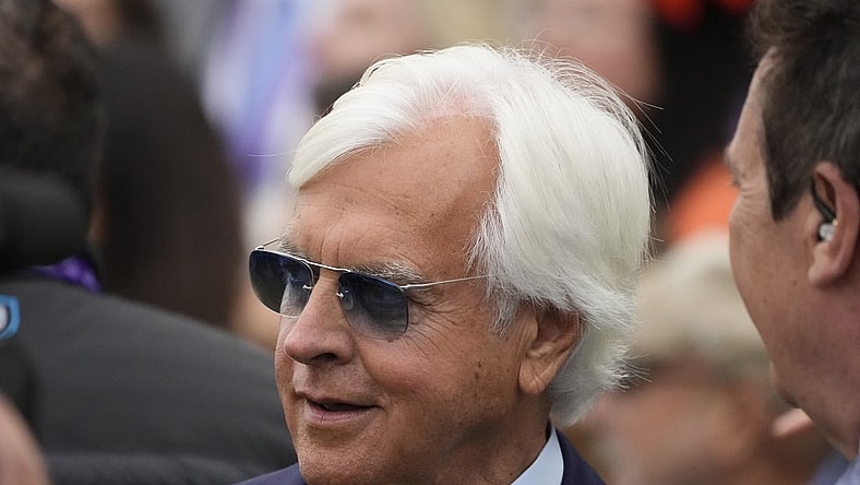 Nov 5, 2021; Del Mar, CA, USA;  Bob Baffert, trainer of Corniche, celebrates his win in the Breeders    Cup Juvenile race during the Breeders    Cup World Championships at Del Mar Race track. Mandatory Credit: Ray Acevedo-USA TODAY Sports