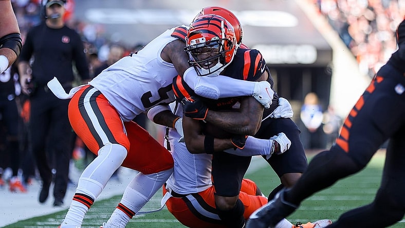 Nov 7, 2021; Cincinnati, Ohio, USA; Cleveland Browns linebacker Mack Wilson (51) tackles Cincinnati Bengals wide receiver Ja'Marr Chase (1) in the first half at Paul Brown Stadium. Mandatory Credit: Katie Stratman-USA TODAY Sports