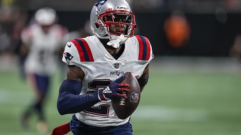 Nov 18, 2021; Atlanta, Georgia, USA; New England Patriots cornerback J.C. Jackson (27) runs after intercepting a pass against the Atlanta Falcons during the fourth quarter at Mercedes-Benz Stadium. Mandatory Credit: Dale Zanine-USA TODAY Sports