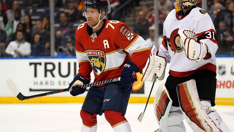 Dec 14, 2021; Sunrise, Florida, USA; Florida Panthers right wing Patric Hornqvist (70) screens Ottawa Senators goaltender Anton Forsberg (31) during the second period at FLA Live Arena. Mandatory Credit: Jasen Vinlove-USA TODAY Sports