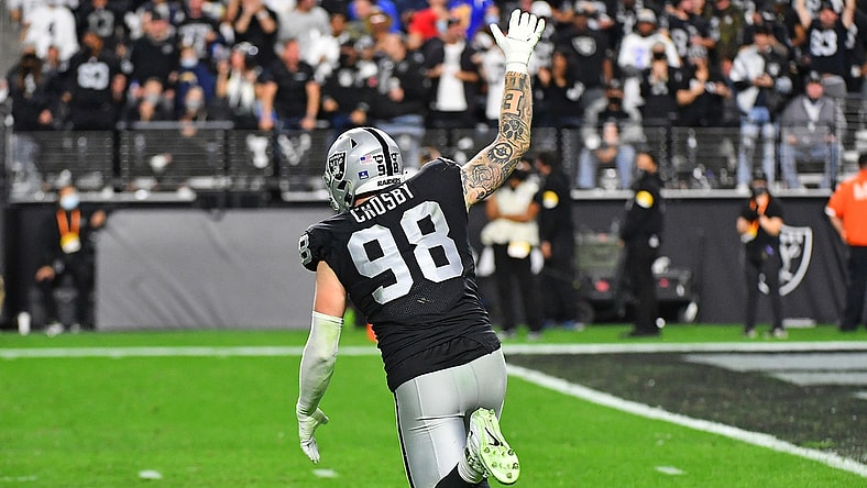 Jan 9, 2022; Paradise, Nevada, USA; Las Vegas Raiders defensive end Maxx Crosby (98) celebrates after sacking Los Angeles Chargers quarterback Justin Herbert (10) at Allegiant Stadium. Mandatory Credit: Stephen R. Sylvanie-USA TODAY Sports
