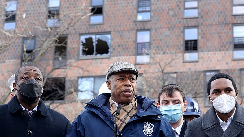 Jan 10, 2022; Bronx, New York, USA; New York City Mayor Eric Adams and other officials speak to the media at the Twin Parks North West apartment building in the Bronx Jan. 10, 2022. Seventeen people died in a fire in the building on Sunday. The fire was believed to have been caused by a defective space heater which caused heavy smoke conditions throughout the building. Mandatory Credit: Seth Harrison-USA TODAY