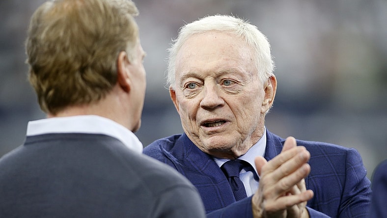 Jan 16, 2022; Arlington, Texas, USA; Dallas Cowboys owner Jerry Jones talks (R) with NFL Commissioner Roger Goodell (L) before the game against the San Francisco 49ers in a NFC Wild Card playoff football game at AT&T Stadium. Mandatory Credit: Tim Heitman-USA TODAY Sports