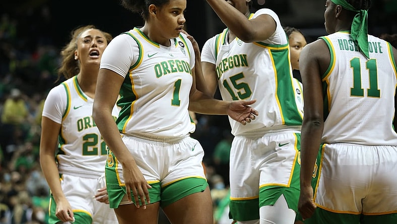 Oregon's Nyara Sabally, center, is congradulated by teammates during the game against Arizona in Eugene Saturday Jan. 15, 2022.

Fb Eug 011522 Uo Women Bkb 21