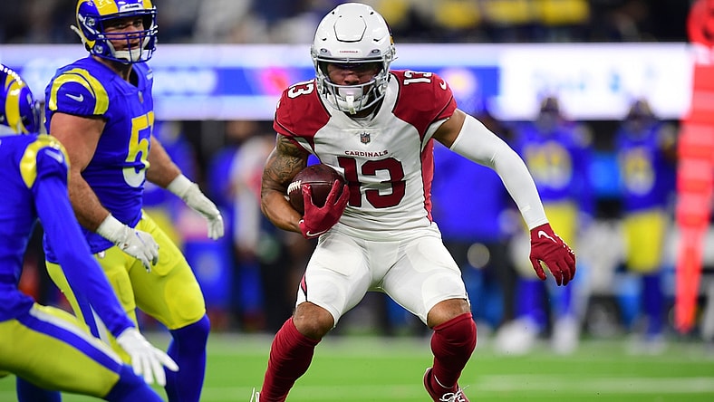 Jan 17, 2022; Inglewood, California, USA; Arizona Cardinals wide receiver Christian Kirk (13) runs the ball against the Los Angeles Rams during the second half in the NFC Wild Card playoff football game at SoFi Stadium. Mandatory Credit: Gary A. Vasquez-USA TODAY Sports