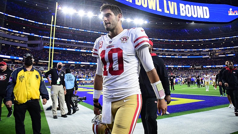 Jan 30, 2022; Inglewood, California, USA; San Francisco 49ers quarterback Jimmy Garoppolo leaves the field after losing to the Los Angeles Rams in the NFC Championship Game at SoFi Stadium. Mandatory Credit: Gary A. Vasquez-USA TODAY Sports