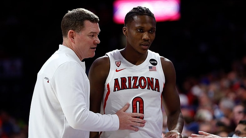 Feb 3, 2022; Tucson, Arizona, USA; Arizona Wildcats head coach Tommy Lloyd talks with guard Bennedict Mathurin (0) during the first half against the UCLA Bruins at McKale Center. Mandatory Credit: The Wildcats beat the Bruins 76-66. Chris Coduto-USA TODAY Sports