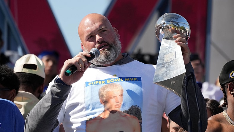 Feb 16, 2022; Los Angeles, CA, USA; Los Angeles Rams tackle Andrew Whitworth holds the Vince Lombardi trophy during the Super Bowl LVI championship rally at the Los Angeles Memorial Coliseum. Mandatory Credit: Kirby Lee-USA TODAY Sports