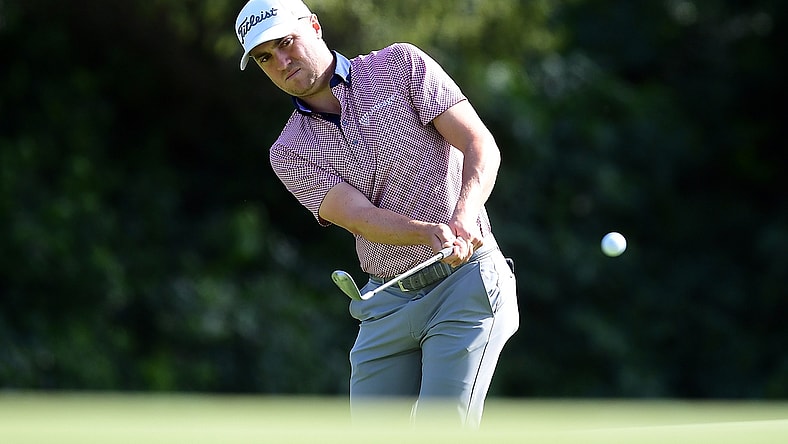 Feb 19, 2022; Pacific Palisades, California, USA; Justin Thomas plays his shot onto the twelfth green during the third round of the Genesis Invitational golf tournament. Mandatory Credit: Gary A. Vasquez-USA TODAY Sports