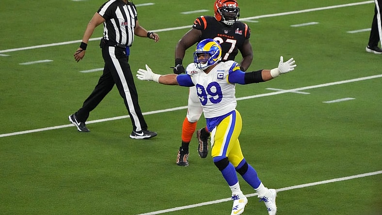 Feb 13, 2022; Inglewood, California, USA; Los Angeles Rams defensive end Aaron Donald (99) celebrates in the fourth quarter against the Cincinnati Bengals in Super Bowl LVI at SoFi Stadium. The Rams defeated the Bengals 23-20. Mandatory Credit: Kirby Lee-USA TODAY Sports