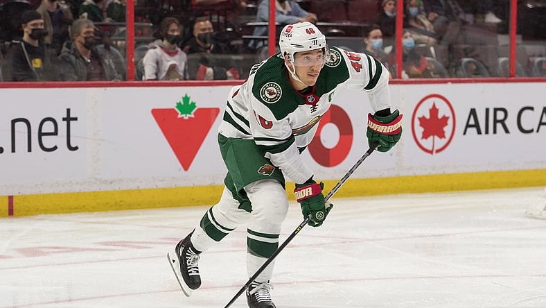 Feb 22, 2022; Ottawa, Ontario, CAN; Minnesota Wild defenseman Jared Spurgeon (46) skates with the puck in the second period against the Ottawa Senators at the Canadian Tire Centre. Mandatory Credit: Marc DesRosiers-USA TODAY Sports