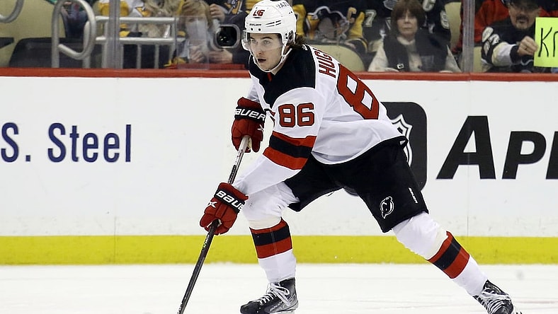 Feb 24, 2022; Pittsburgh, Pennsylvania, USA;  New Jersey Devils center Jack Hughes (86) skates up ice with the puck against the Pittsburgh Penguins during the first period at PPG Paints Arena. Mandatory Credit: Charles LeClaire-USA TODAY Sports