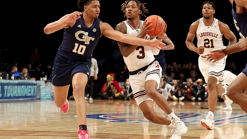 Mar 8, 2022; Brooklyn, NY, USA; Louisville Cardinals guard El Ellis (3) drives to the basket against Georgia Tech Yellow Jackets guard Dallan Coleman (10) during the first half at Barclays Center. Mandatory Credit: Brad Penner-USA TODAY Sports