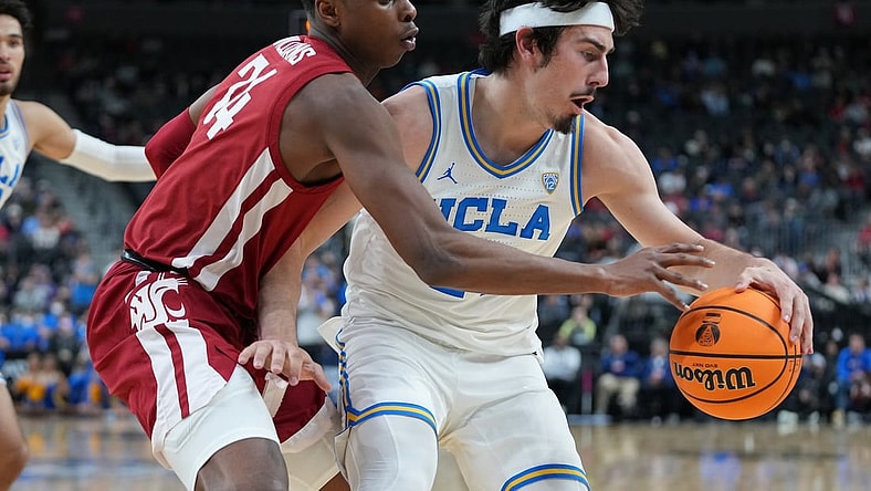 Mar 10, 2022; Las Vegas, NV, USA; Washington State Cougars guard Noah Williams (24) defends against UCLA Bruins guard Jaime Jaquez Jr. (24) during the first half at T-Mobile Arena. Mandatory Credit: Stephen R. Sylvanie-USA TODAY Sports