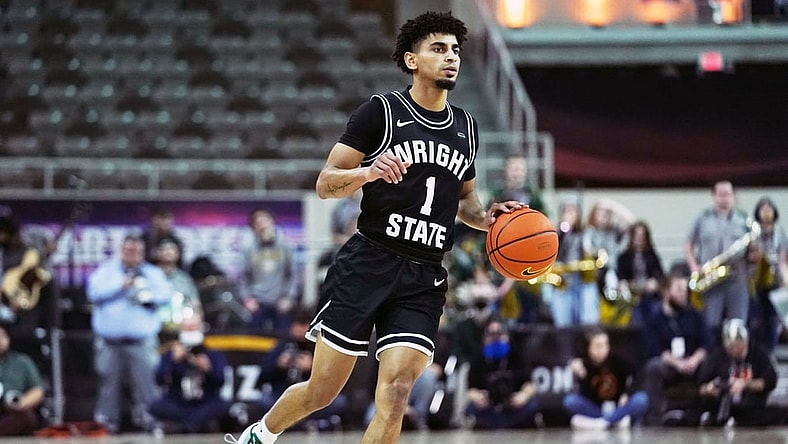Mar 8, 2022; Indianapolis, IN, USA; Wright State Raiders guard Trey Calvin (1) brings the ball up the court during the first half of the Horizon League championship game between Northern Kentucky and Wright State at Indiana Farmers Coliseum. Mandatory Credit: Robert Goddin-USA TODAY Sports