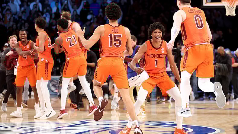 Mar 12, 2022; Brooklyn, NY, USA; Virginia Tech Hokies forward David N'Guessan (1) celebrates with center Lynn Kidd (15) and guard Hunter Cattoor (0) after defeating the Duke Blue Devils 82-67 in the ACC Men's Basketball Tournament final at Barclays Center. Mandatory Credit: Brad Penner-USA TODAY Sports