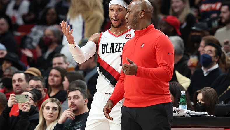 Mar 12, 2022; Portland, Oregon, USA; Portland Trail Blazers guard Josh Hart (11) and head coach Chauncey Billups talk during the second half of a game against the Washington Wizards at Moda Center. Mandatory Credit: Al Sermeno-USA TODAY Sports