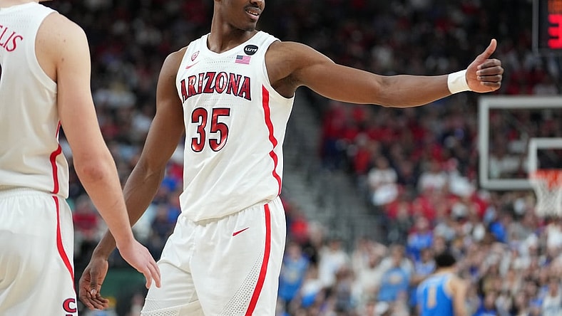 Mar 12, 2022; Las Vegas, NV, USA; Arizona Wildcats center Christian Koloko (35) reacts in a game against the UCLA Bruins during the second half at T-Mobile Arena. Mandatory Credit: Stephen R. Sylvanie-USA TODAY Sports