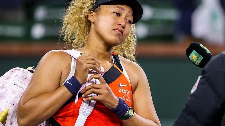 Naomi Osaka of Japan addresses the crowd about being heckled during her match against Veronika Kudermetova of Russia during round two of the BNP Paribas Open at the Indian Wells Tennis Garden in Indian Wells, Calif., Saturday, March 12, 2022.