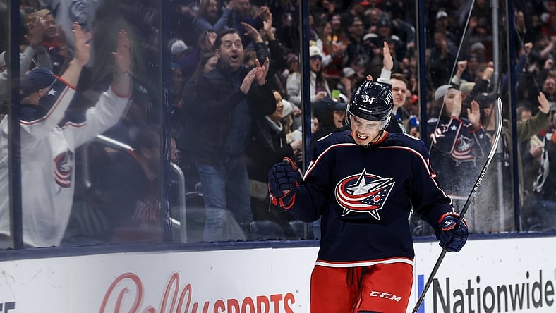 Mar 13, 2022; Columbus, Ohio, USA;  Columbus Blue Jackets center Cole Sillinger (34) celebrates scoring a goal against the Vegas Golden Knights in the second period at Nationwide Arena. Mandatory Credit: Aaron Doster-USA TODAY Sports