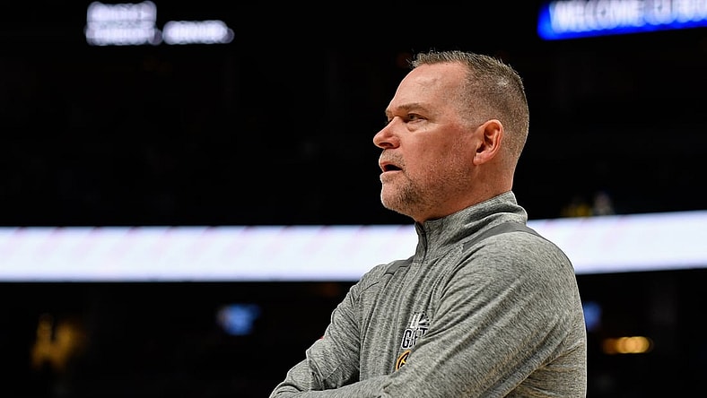 Mar 12, 2022; Denver, Colorado, USA; Denver Nuggets head coach Michael Malone during a timeout against the Toronto Raptors at Ball Arena. Mandatory Credit: John Leyba-USA TODAY Sports