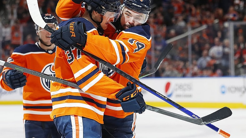 Mar 15, 2022; Edmonton, Alberta, CAN; The Edmonton Oilers celebrate a goal by forward Warren Foegele (37) during the third period against the Detroit Red Wings at Rogers Place. Mandatory Credit: Perry Nelson-USA TODAY Sports