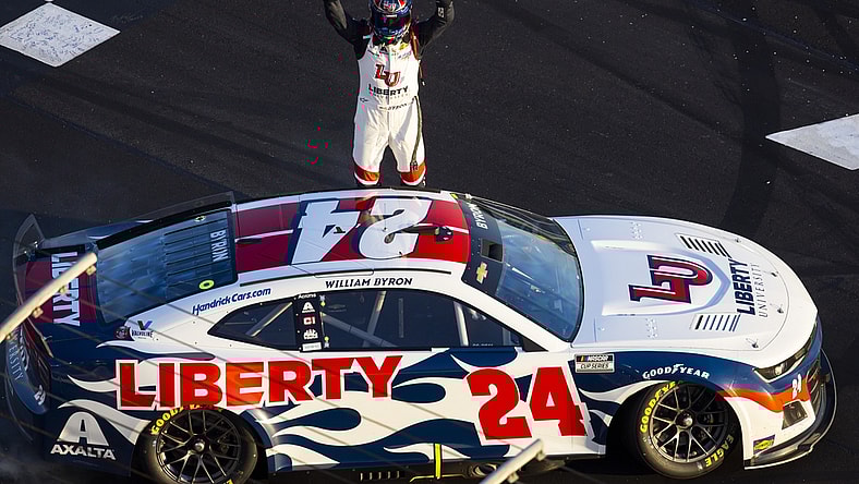 Mar 20, 2022; Hampton, Georgia, USA; NASCAR Cup Series driver William Byron celebrates after winning the Folds of Honor QuikTrip 500 at Atlanta Motor Speedway. Mandatory Credit: Mark J. Rebilas-USA TODAY Sports