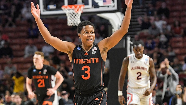 University of Miami guard Charlie Moore (3) celebrates after teammate forward Sam Waardenburg (21) dunked against Auburn University  during the second half of the NCAA Div. 1 Men's Basketball Tournament preliminary round game at Bon Secours Wellness Arena in Greenville, S.C. Sunday, March 20, 2022.

Ncaa Mens Basketball Second Round Miami Vs Auburn