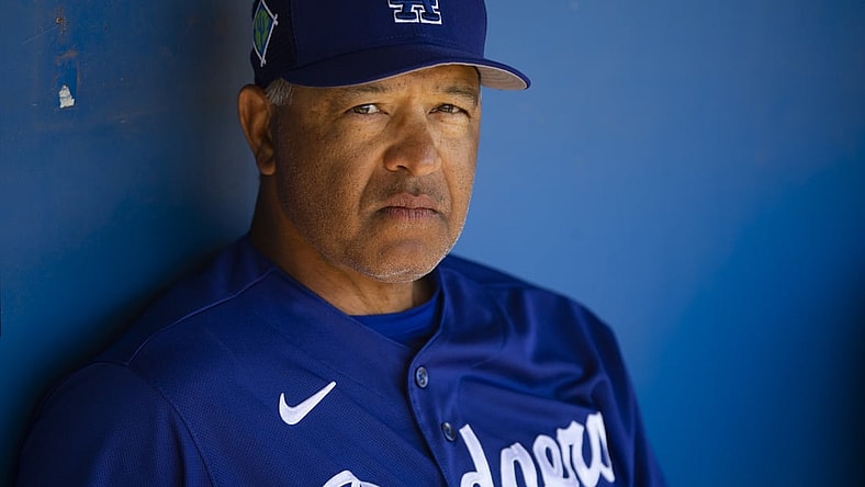 Mar 22, 2022; Phoenix, Arizona, USA; Los Angeles Dodgers manager Dave Roberts against the Cincinnati Reds during a spring training game at Camelback Ranch-Glendale. Mandatory Credit: Mark J. Rebilas-USA TODAY Sports