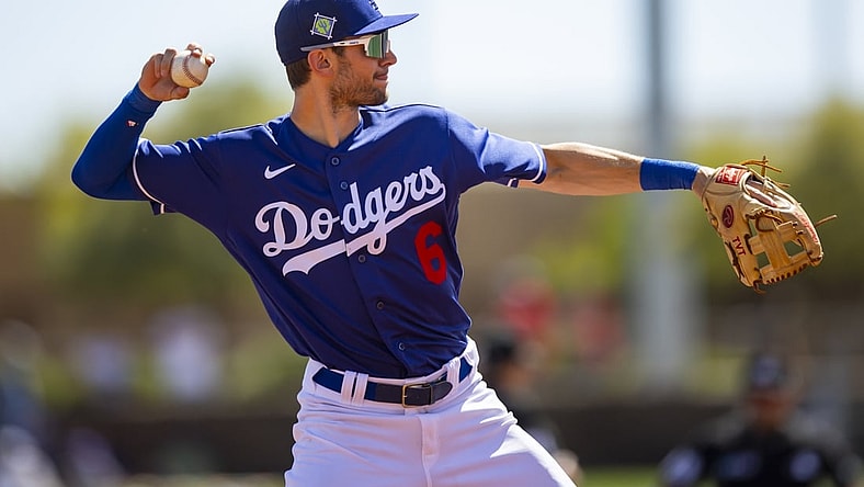 Mar 22, 2022; Phoenix, Arizona, USA; Los Angeles Dodgers third baseman Trea Turner against the Cincinnati Reds during a spring training game at Camelback Ranch-Glendale. Mandatory Credit: Mark J. Rebilas-USA TODAY Sports