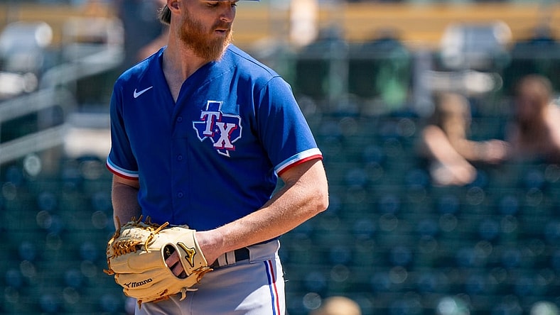 Mar 24, 2022; Mesa, Arizona, USA; Texas Rangers pitcher Jon Gray (22) on the mound in the first inning during a spring training game against the Oakland Athletics at Hohokam Stadium. Mandatory Credit: Allan Henry-USA TODAY Sports