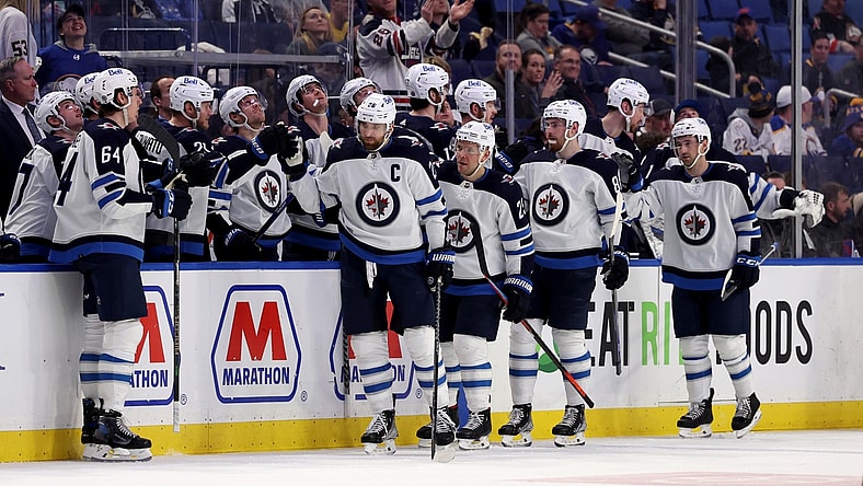 Mar 30, 2022; Buffalo, New York, USA;  Winnipeg Jets right wing Blake Wheeler (26) celebrates his goal during the second period with teammates against the Buffalo Sabres at KeyBank Center. Mandatory Credit: Timothy T. Ludwig-USA TODAY Sports