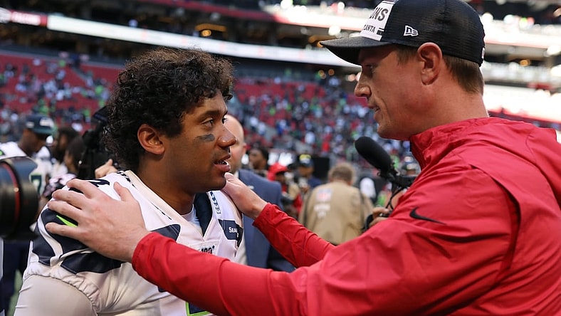Oct 27, 2019; Atlanta, GA, USA; Seattle Seahawks quarterback Russell Wilson (3) talks with Atlanta Falcons quarterback Matt Ryan (right) after a game at Mercedes-Benz Stadium. Mandatory Credit: Jason Getz-USA TODAY Sports