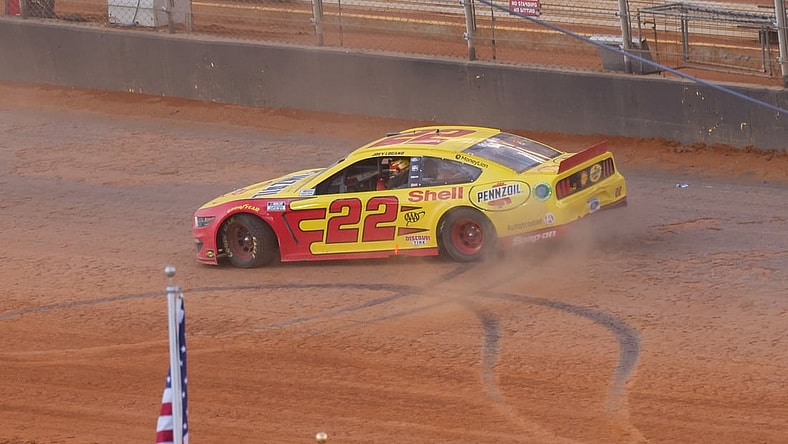 Mar 29, 2021; Bristol, TN, USA; NASCAR Cup Series driver Joey Logano (22) wins the Food City Dirt Race at Bristol Motor Speedway. Mandatory Credit: Randy Sartin-USA TODAY Sports