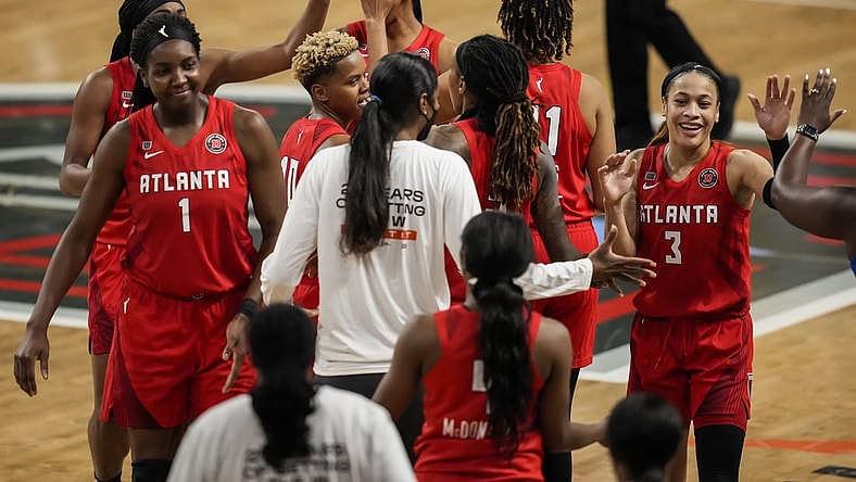 May 27, 2021; College Park, Georgia, USA; Atlanta Dream players react after defeating the Dallas Wings at Gateway Center Arena at College Park. Mandatory Credit: Dale Zanine-USA TODAY Sports