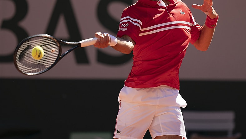 Jun 13, 2021; Paris, France; Novak Djokovic (SRB) in action during the men's final against Stefanos Tsitsipas (GRE) on day 15 of the French Open at Stade Roland Garros. Mandatory Credit: Susan Mullane-USA TODAY Sports