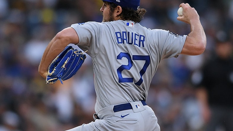 Jun 23, 2021; San Diego, California, USA; Los Angeles Dodgers starting pitcher Trevor Bauer (27) throws a pitch against the San Diego Padres during the first inning at Petco Park. Mandatory Credit: Orlando Ramirez-USA TODAY Sports
