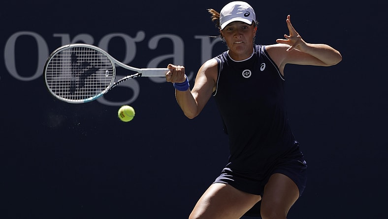 Sep 6, 2021; Flushing, NY, USA; Iga Swiatek of Poland hits a forehand against Belinda Bencic of Switzerland (not pictured) on day eight of the 2021 U.S. Open tennis tournament at USTA Billie Jean King National Tennis Center. Mandatory Credit: Geoff Burke-USA TODAY Sports