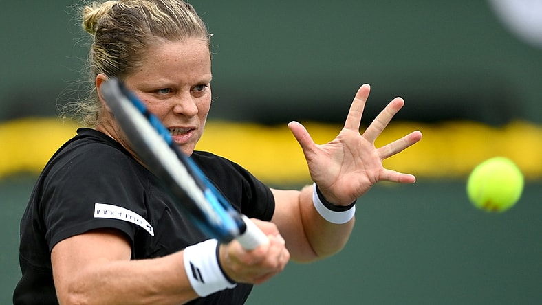 Oct 7, 2021; Indian Wells, CA, USA; Kim Clijsters (BEL) hits a shot in her first round match against Katerina Siniakova (CZE) in the BNP Paribas Open at the Indian Wells Tennis Garden. Mandatory Credit: Jayne Kamin-Oncea-USA TODAY Sports