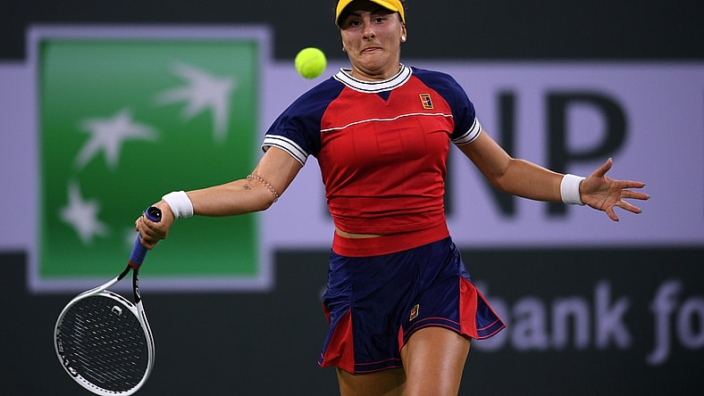 Oct 9, 2021; Indian Wells, CA, USA; Bianca Andreescu (CAN) hits a shot against Alison Riske (USA) at Indian Wells Tennis Garden. Mandatory Credit: Orlando Ramirez-USA TODAY Sports
