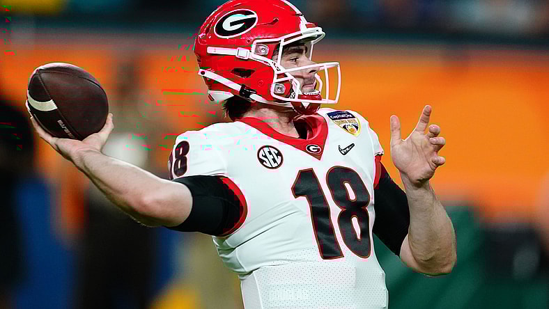 Dec 31, 2021; Miami Gardens, FL, USA; Georgia Bulldogs quarterback JT Daniels (18) warms up prior to the Orange Bowl college football CFP national semifinal game against the Michigan Wolverines at Hard Rock Stadium. Mandatory Credit: John David Mercer-USA TODAY Sports