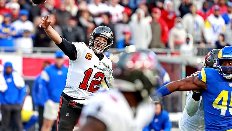Jan 23, 2022; Tampa, Florida, USA; Tampa Bay Buccaneers quarterback Tom Brady (12) throws a the ball during the second half against the Los Angeles Rams in a NFC Divisional playoff football game at Raymond James Stadium. Mandatory Credit: Matt Pendleton-USA TODAY Sports